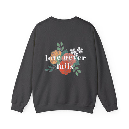 LOVE NEVER FAILS CREWNECK