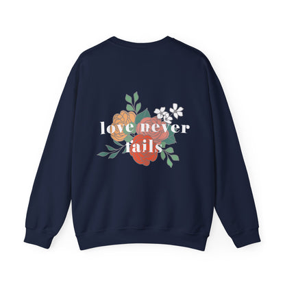 LOVE NEVER FAILS CREWNECK